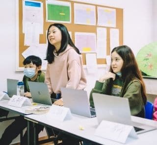 XIS Middle School Students Debating